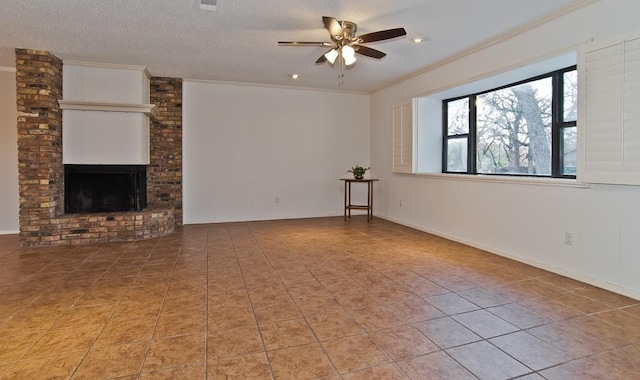 unfurnished living room featuring crown molding, a fireplace, tile patterned flooring, and a textured ceiling