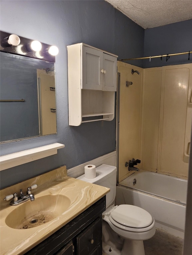 full bathroom with vanity,  shower combination, toilet, and a textured ceiling