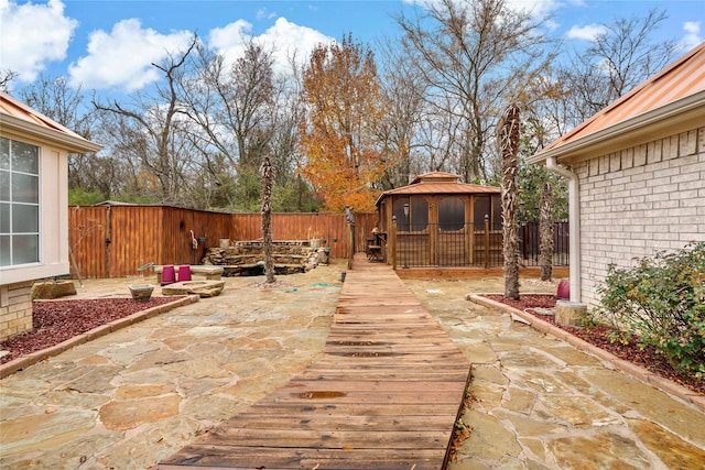 view of patio featuring a gazebo