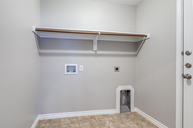 carpeted empty room featuring ceiling fan and baseboards