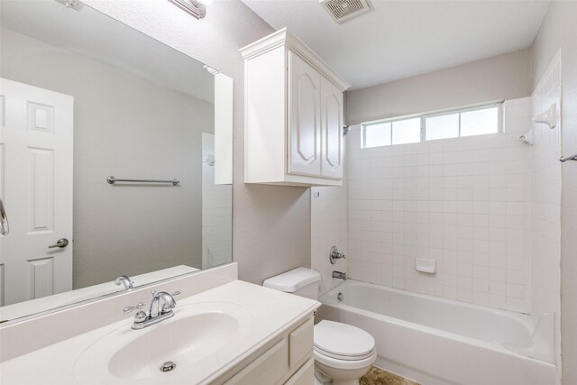 full bath featuring baseboards, vanity, and tile patterned floors
