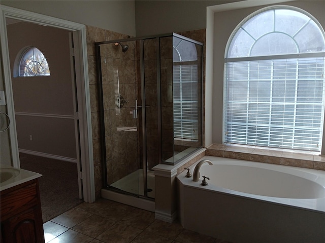 bathroom with vanity, separate shower and tub, and tile patterned floors