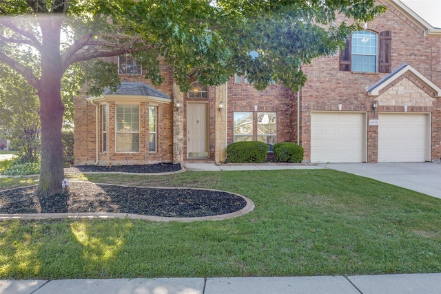 view of front facade with brick siding, driveway, and a garage