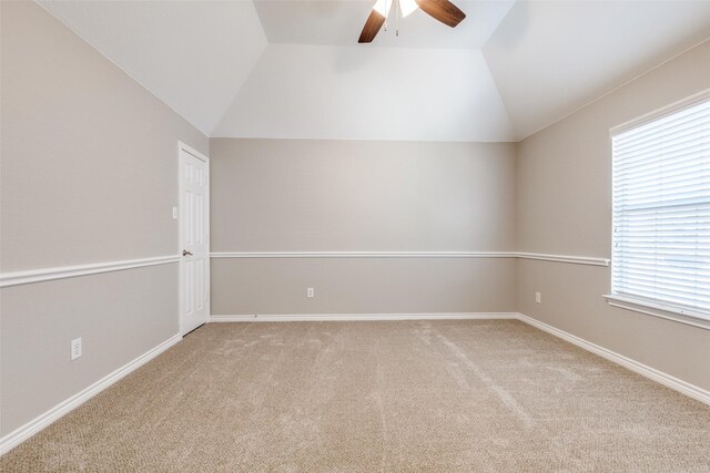 stairway with visible vents, wood finished floors, high vaulted ceiling, and ceiling fan