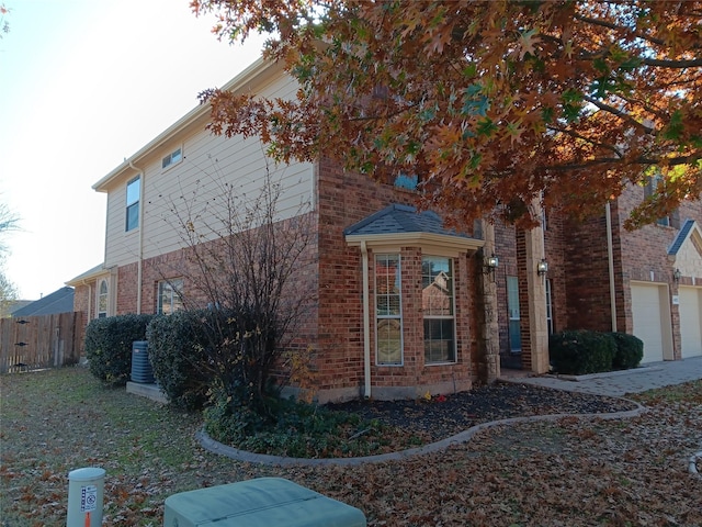 view of property exterior with a garage