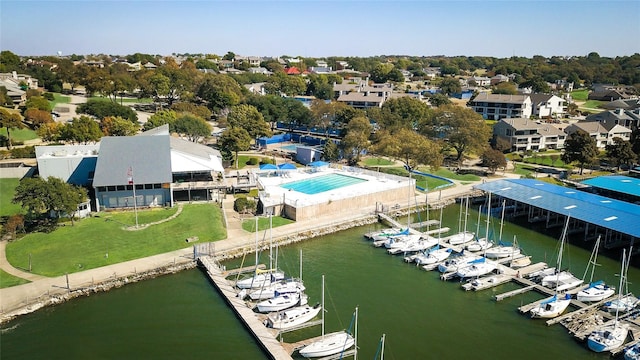 birds eye view of property featuring a water view