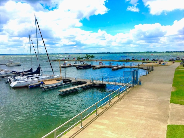 dock area featuring a water view