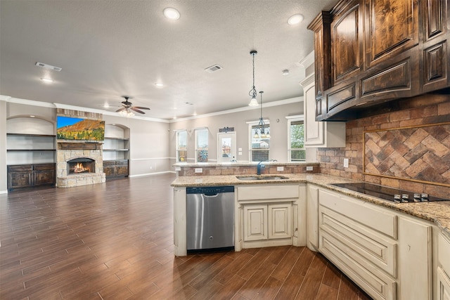 119 Remington Park Dr, Springtown, TX 76082 - kitchen with black electric cooktop, stainless steel dishwasher, a sink, ceiling fan, and a peninsula