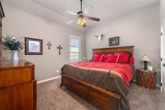 bedroom with ceiling fan, carpet floors, and lofted ceiling