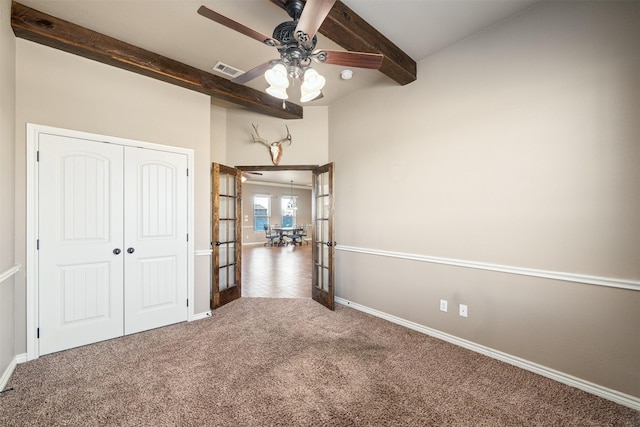 119 Remington Park Dr, Springtown, TX 76082 - unfurnished bedroom with carpet flooring, french doors, lofted ceiling with beams, visible vents, and a closet