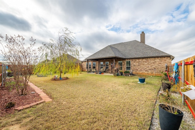 119 Remington Park Dr, Springtown, TX 76082 - view of yard with a patio and a fenced backyard