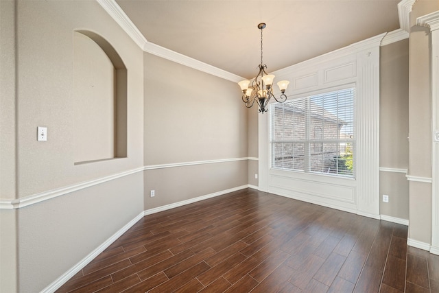 119 Remington Park Dr, Springtown, TX 76082 - empty room with an inviting chandelier, ornamental molding, baseboards, and dark wood finished floors