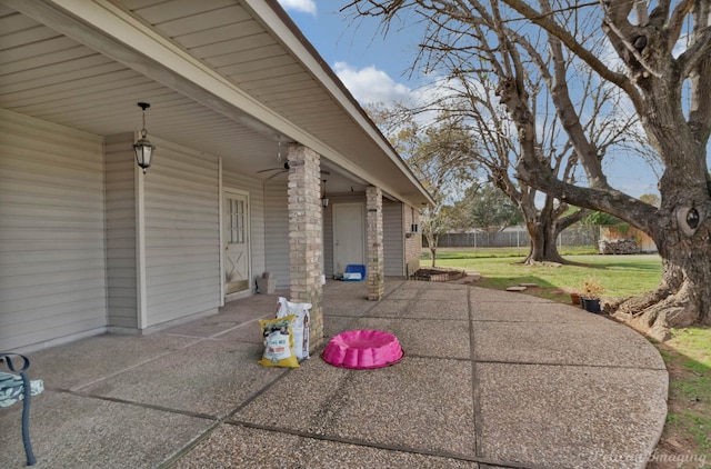 view of patio with ceiling fan