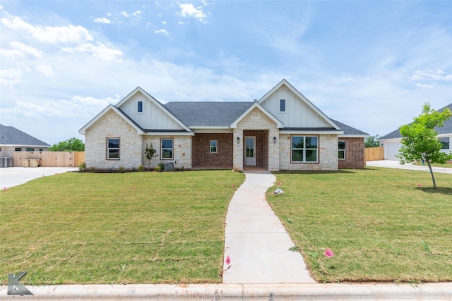 145 Colorado, Abilene, TX 79606 - view of front of house featuring board and batten siding and stone siding
