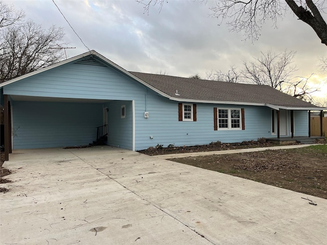 view of front of house with a carport