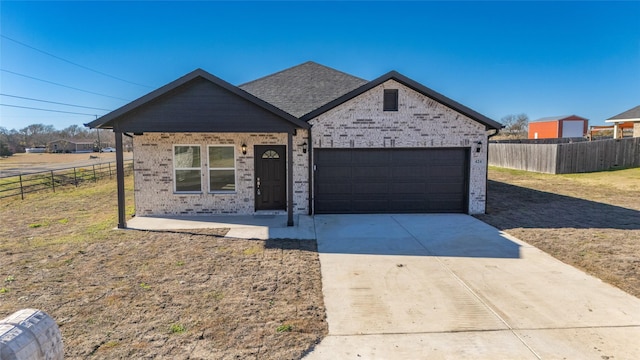 view of front of home with a garage