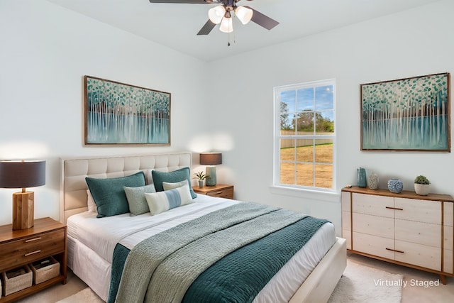 carpeted bedroom featuring ceiling fan