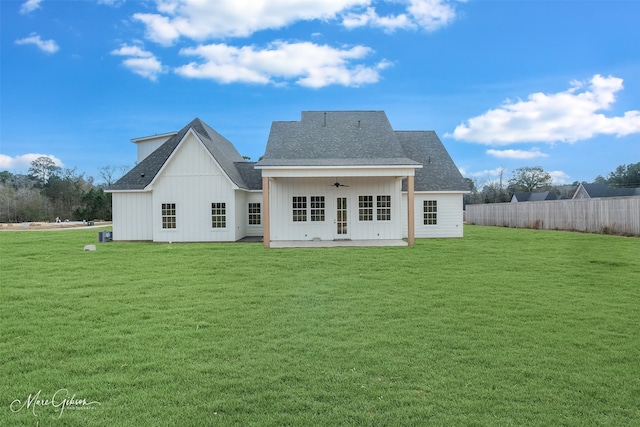 back of house featuring a patio, a yard, and ceiling fan