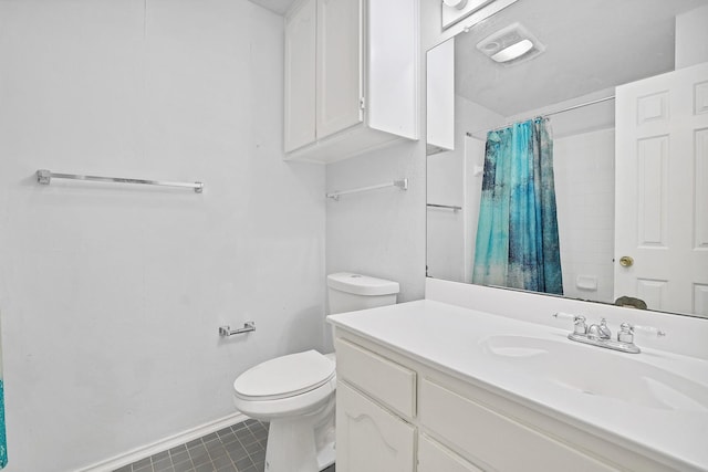 bathroom featuring tile patterned flooring, vanity, a shower with shower curtain, and toilet