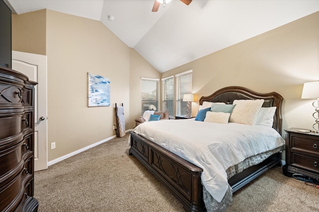 carpeted bedroom featuring ceiling fan and vaulted ceiling