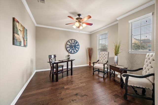 sitting room with ceiling fan, dark wood-type flooring, and ornamental molding