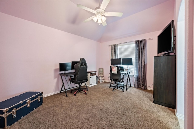 carpeted office space featuring ceiling fan and lofted ceiling