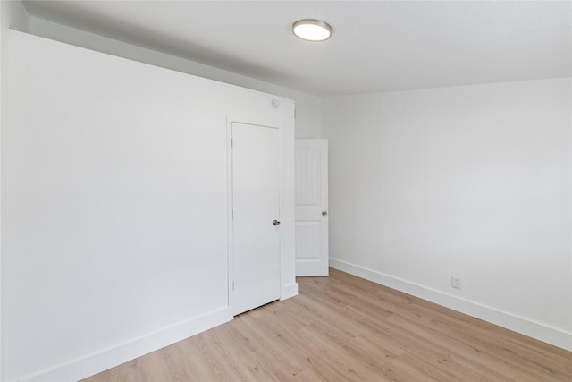 empty room with light wood-type flooring