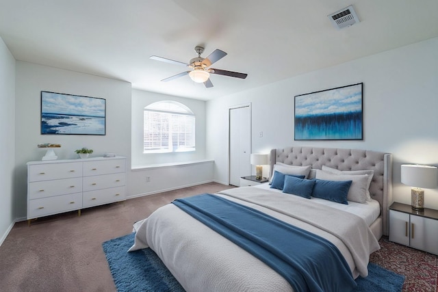 carpeted bedroom with ceiling fan