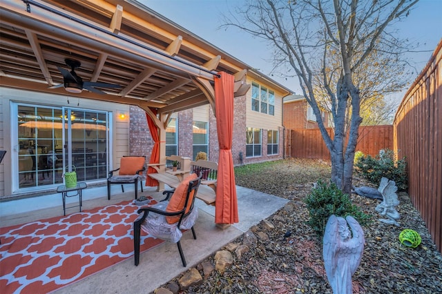 view of patio / terrace featuring ceiling fan