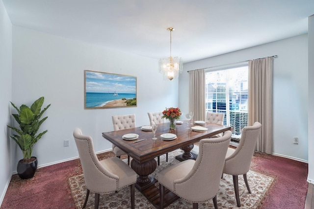 carpeted dining space with a notable chandelier