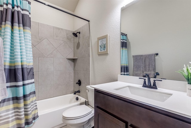 full bathroom with vanity, shower / bath combination with curtain, and toilet