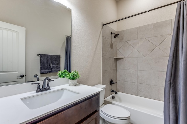 full bathroom featuring shower / bath combination with curtain, toilet, and vanity