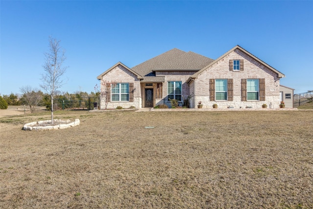 craftsman-style house with a front yard