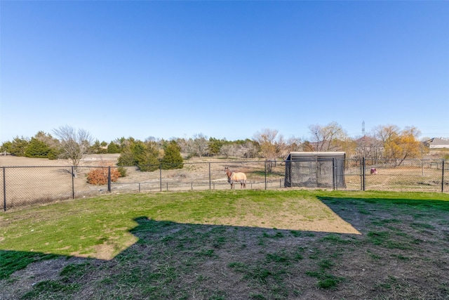 view of yard with a rural view