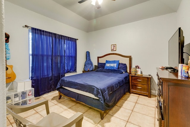 bedroom featuring light tile patterned floors and ceiling fan