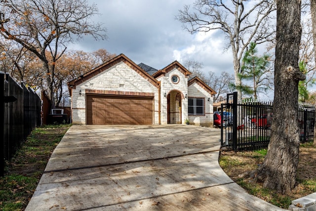 view of front of property with a garage