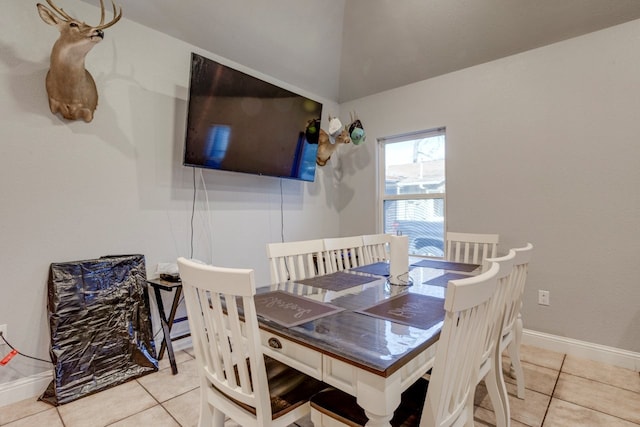 dining room with light tile patterned flooring