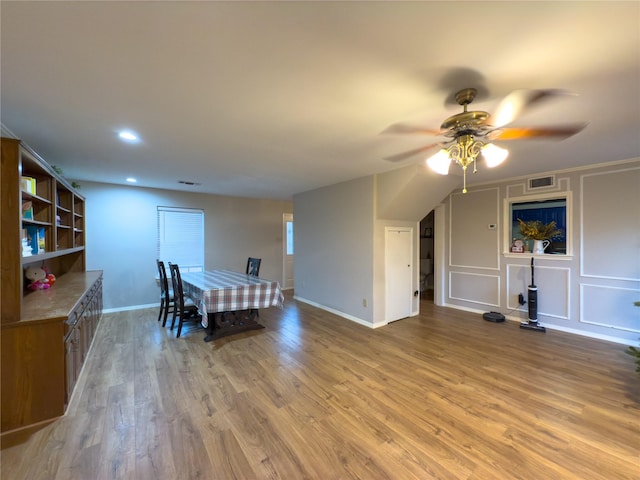 dining room featuring hardwood / wood-style flooring and ceiling fan