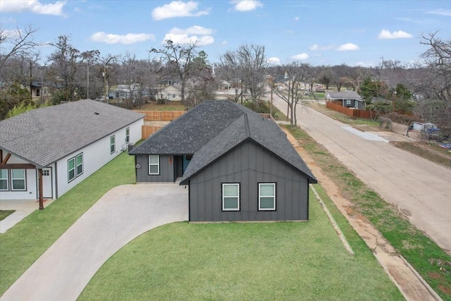 exterior space with a front lawn