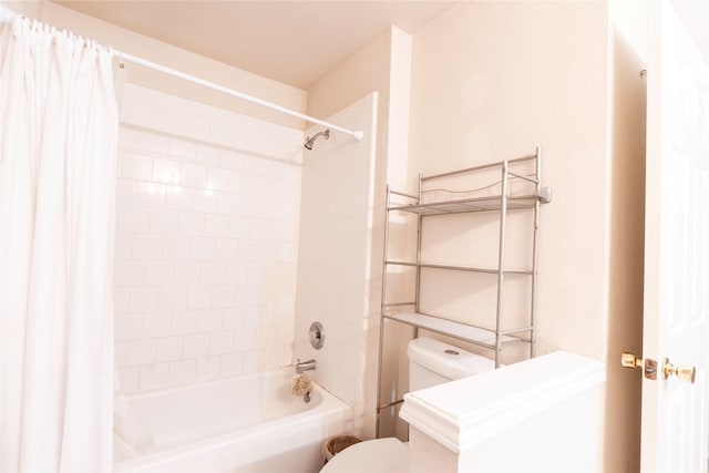 bathroom with shower / tub combo with curtain and toilet