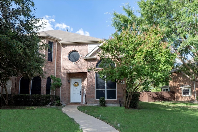 view of front of home with a front yard