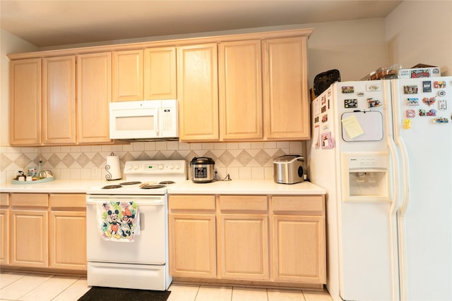 kitchen featuring tasteful backsplash, white appliances, light tile patterned flooring, and light brown cabinets