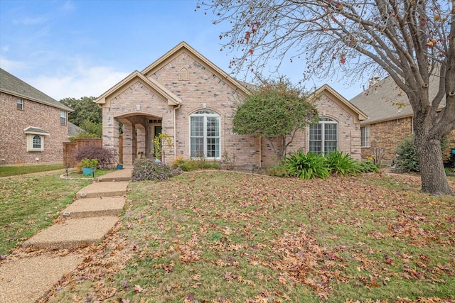 view of front facade with a front lawn