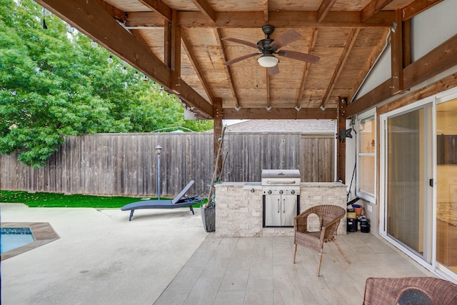 view of patio / terrace with area for grilling and ceiling fan