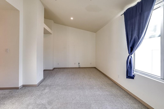 empty room with light colored carpet