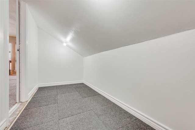 bonus room with vaulted ceiling