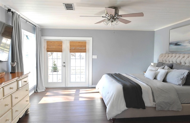 bedroom with french doors, dark hardwood / wood-style flooring, ceiling fan, and ornamental molding