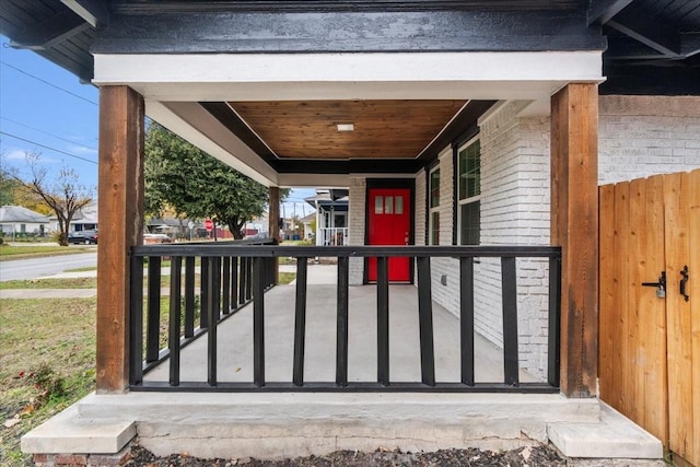 entrance to property featuring covered porch