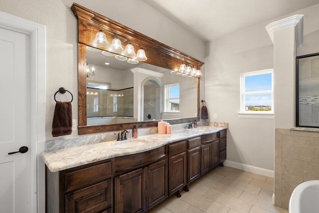 bathroom featuring tile patterned flooring, vanity, and shower with separate bathtub