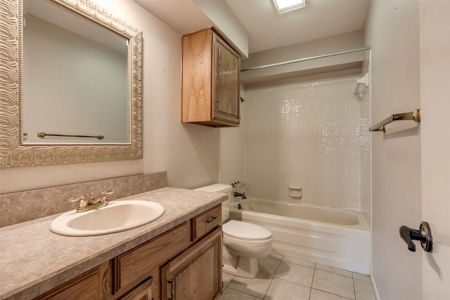 full bathroom with washtub / shower combination, tile patterned floors, toilet, and vanity